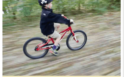 Raising a child riding a bike